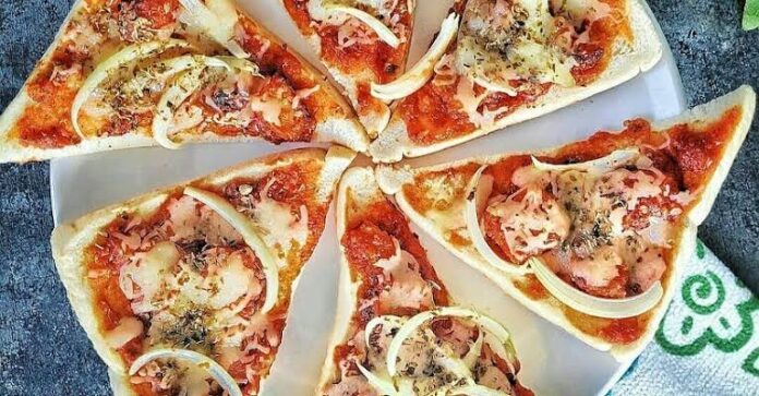 membuat pizza